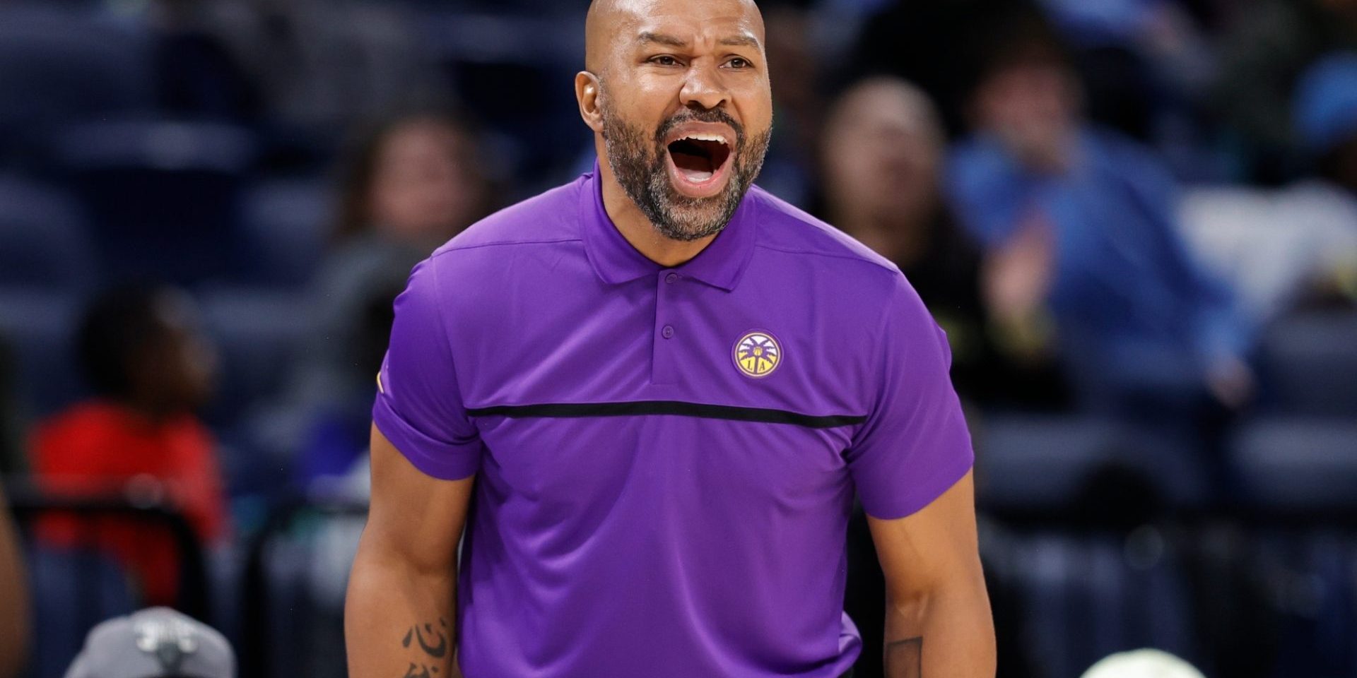 Los Angeles Sparks head coach and general manager Derek Fisher yells to his team during the first half of the WNBA basketball game against the Chicago Sky, Friday, May 6, 2022, in Chicago. (AP Photo/Kamil Krzaczynski)