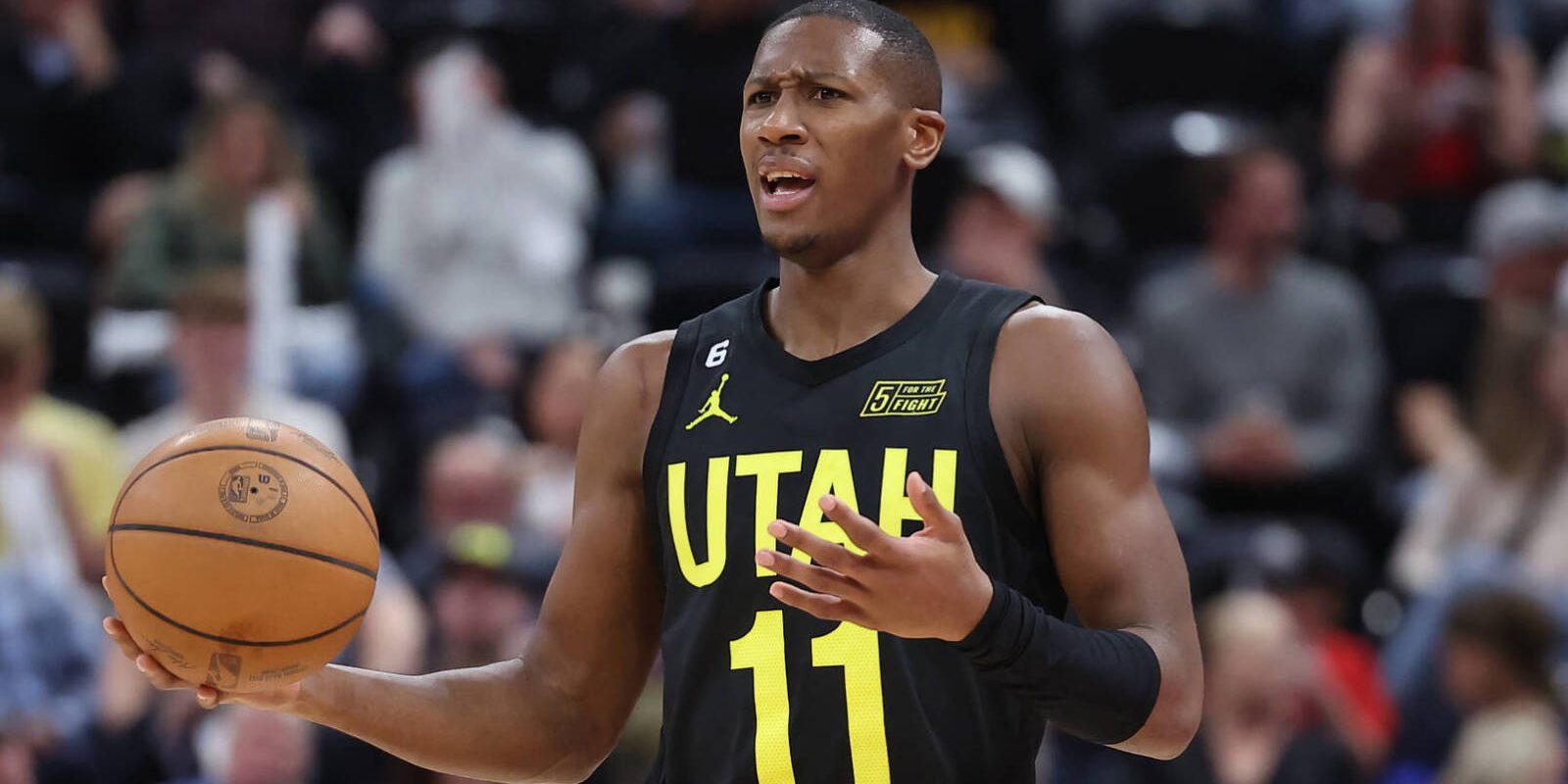 Apr 8, 2023; Salt Lake City, Utah, USA; Utah Jazz guard Kris Dunn (11) brings the ball up the court against the Denver Nuggets in the third quarter at Vivint Arena. Mandatory Credit: Rob Gray-USA TODAY Sports