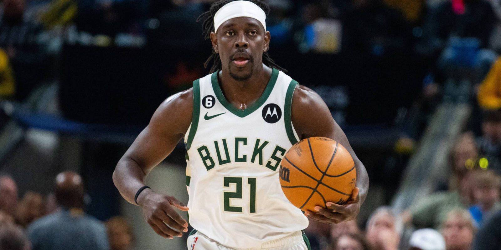Mar 29, 2023; Indianapolis, Indiana, USA; Milwaukee Bucks guard Jrue Holiday (21) dribbles the ball in the first quarter against the Indiana Pacers at Gainbridge Fieldhouse. Mandatory Credit: Trevor Ruszkowski-USA TODAY Sports